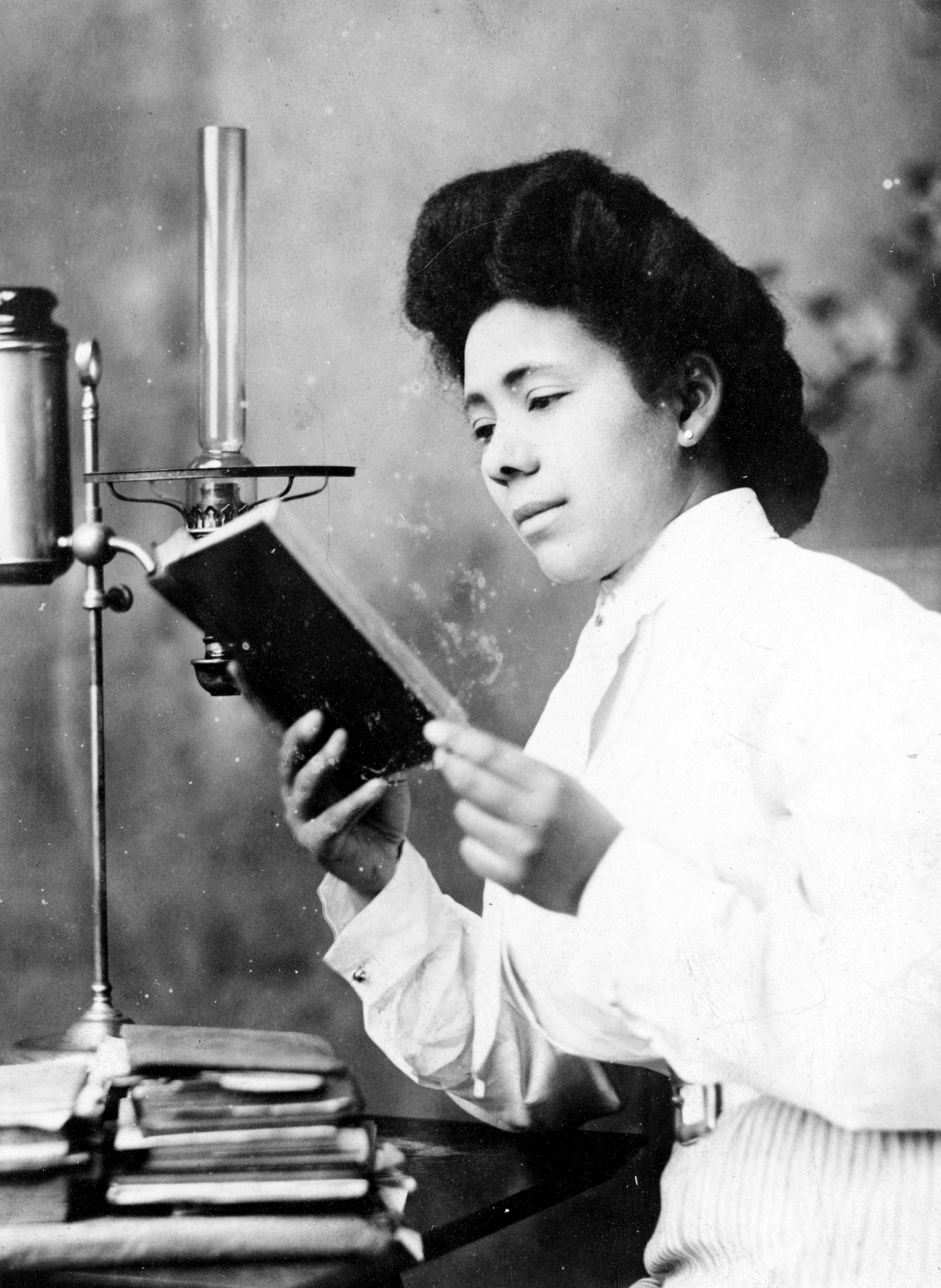 Historical woman reading a book